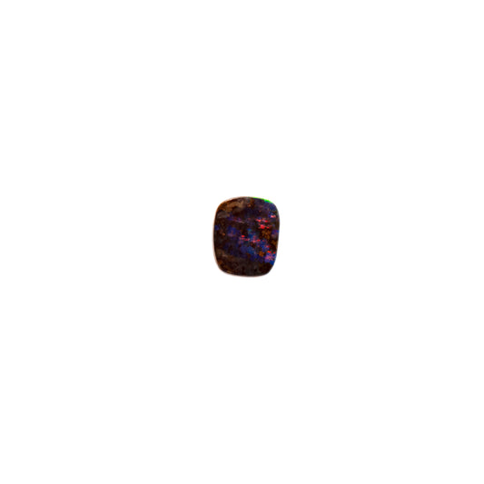 1.08ct Queensland Boulder Opal in a free-form square cut, showcasing rich dark blue tones with a flash of deep red and hints of green on a contrasting dark ironstone background. | Opalist